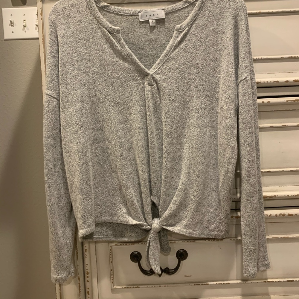 light grey sweater